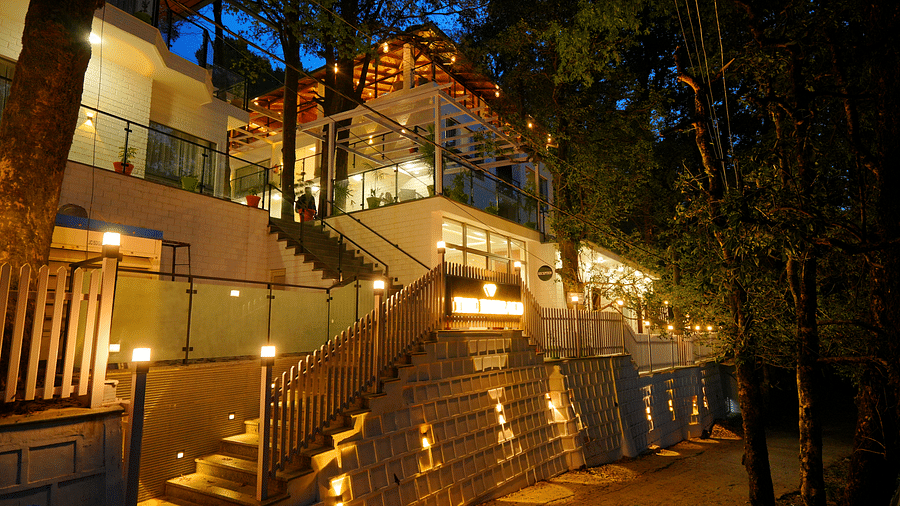 A facade image shot at night  of DLS The Emerald, Nainital which is lit with bright lighting